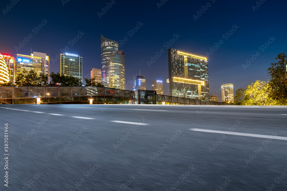 Road ground and modern architectural landscape skyline of Chinese city