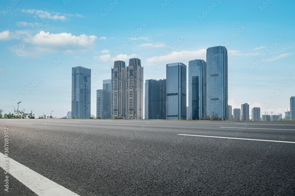 Road ground and modern architectural landscape skyline of Chinese city