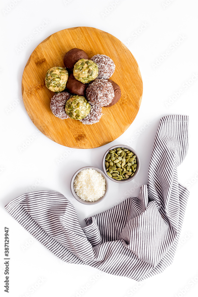 Overhead view of vegan energy protein balls with nuts