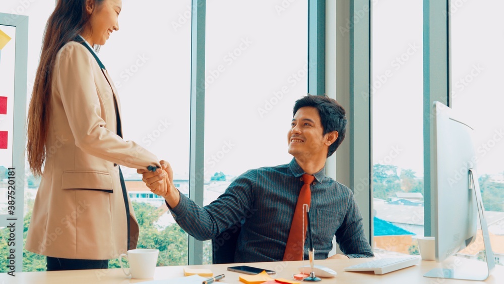 Two business people talk project strategy at office meeting room. Businessman discuss project planni