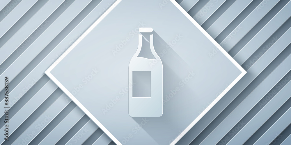 Paper cut Wine bottle icon isolated on grey background. Paper art style. Vector.