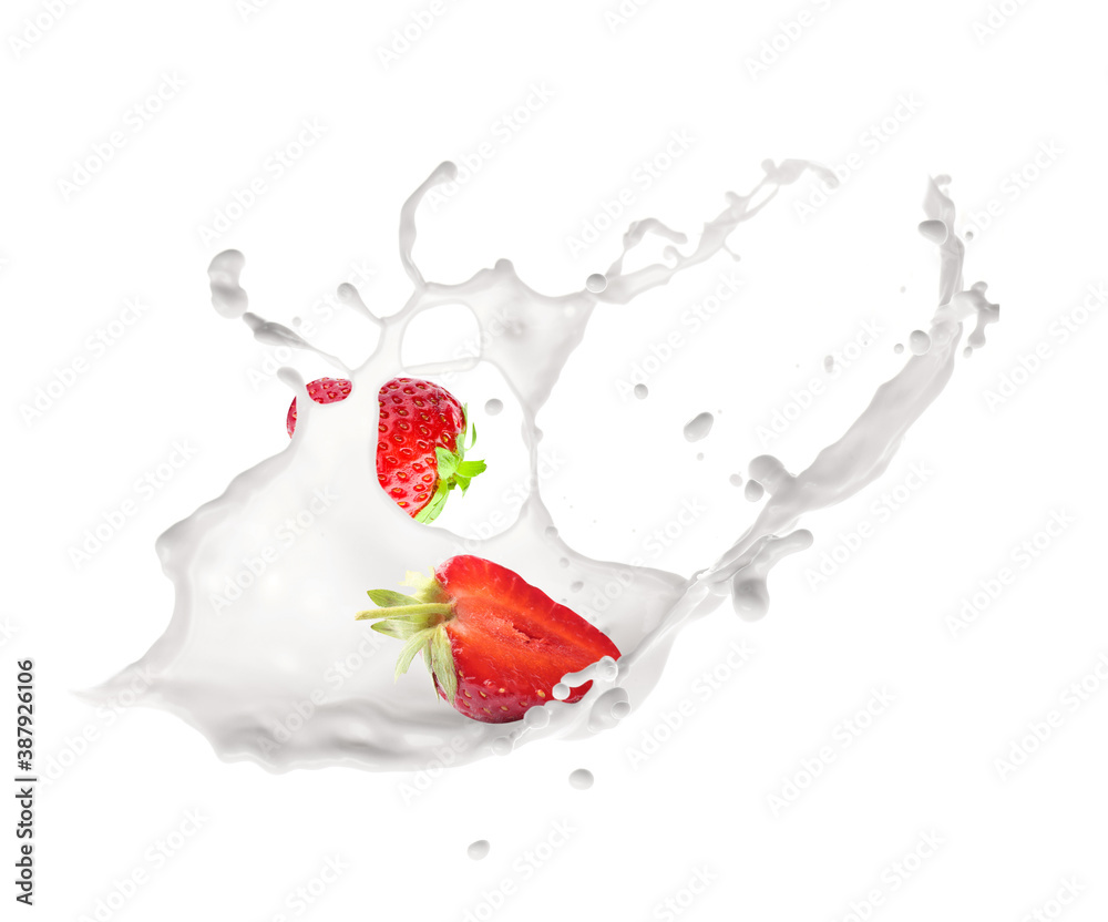 Splash of milk with strawberry on white background