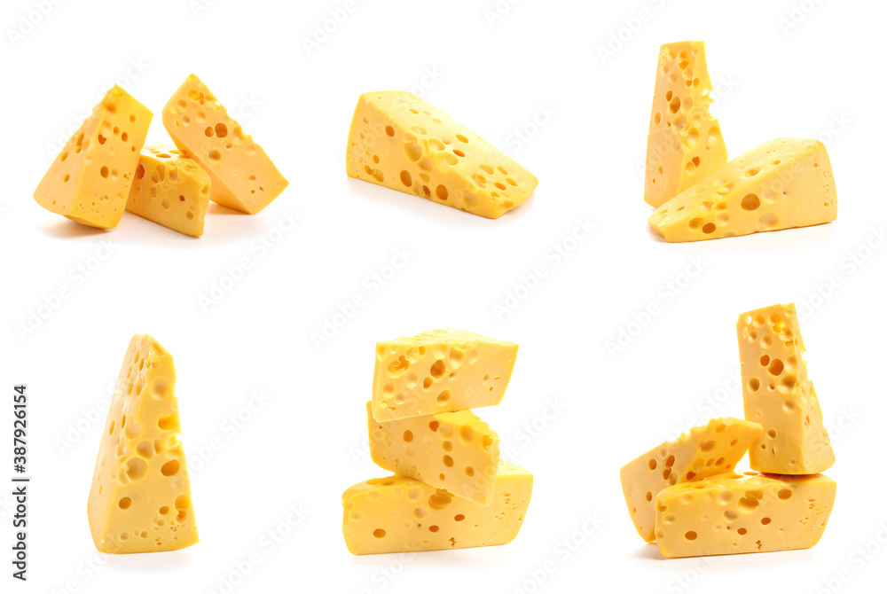 Pieces of tasty cheese on white background