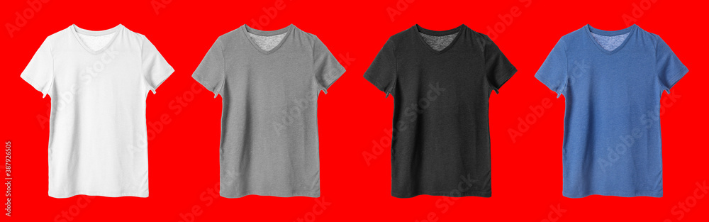 Different blank t-shirts on color background