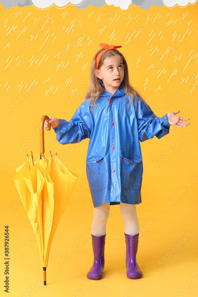 Cute little girl in raincoat and with umbrella under drawn rain drops on color background