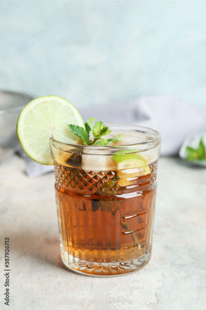 Glass of tasty Cuba Libre cocktail on table