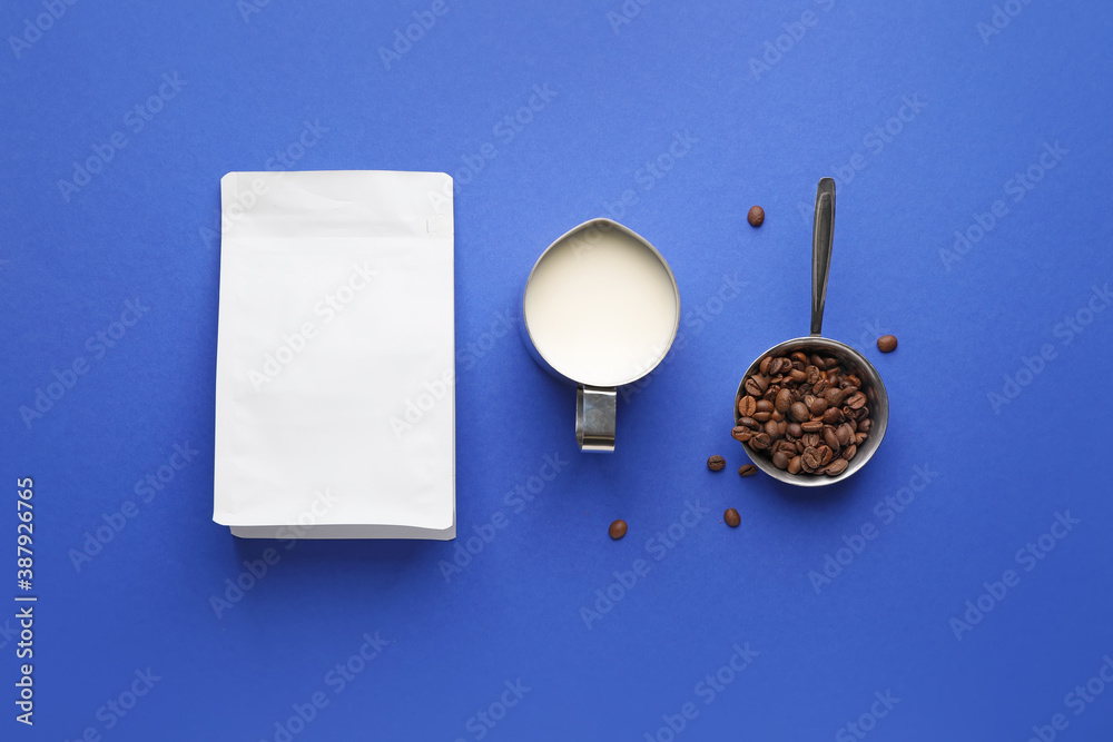 Composition with aromatic coffee and milk on color background