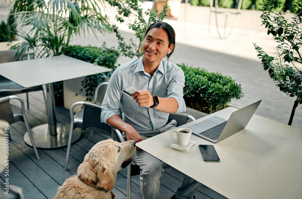 Man with dog in the city