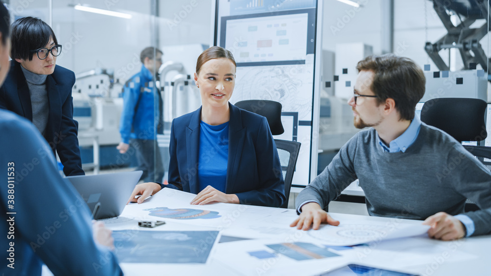 Modern Factory Office Meeting Room: Young Female Specialist Reports to Diverse Team of Engineers, Ma