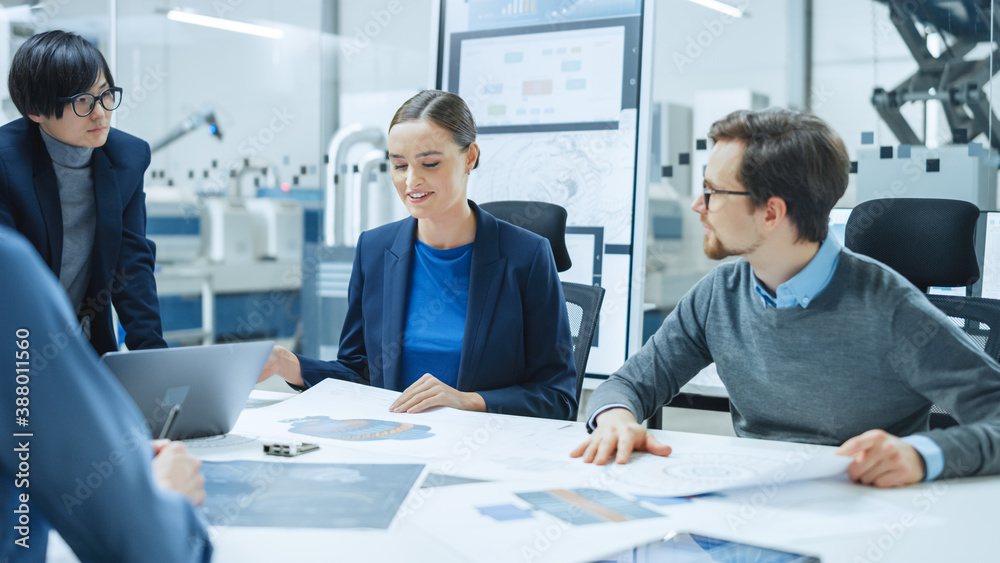 Modern Factory Office Meeting Room: Young Female Specialist Reports to Diverse Team of Engineers, Ma