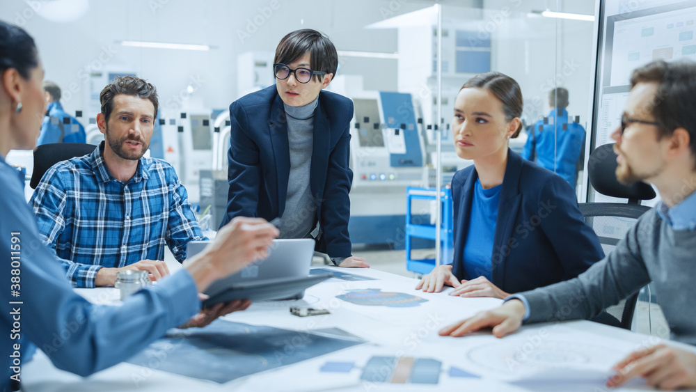 Modern Factory Office Meeting Room: Multi-Ethnic and Diverse Team of Engineers Managers Investors Ta