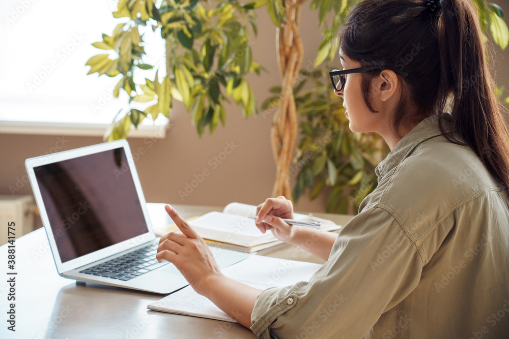 Indian woman online tutor remote school teacher, distanced office worker talking during virtual clas