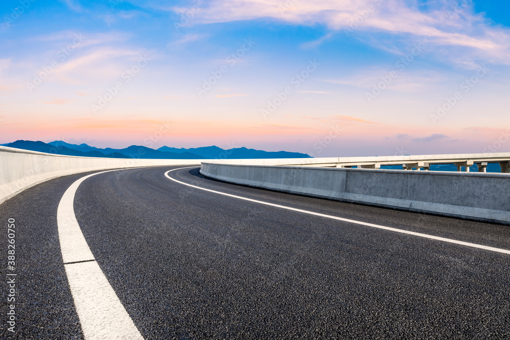 Asphalt viaduct road and beautiful sky cloud at sunrise.