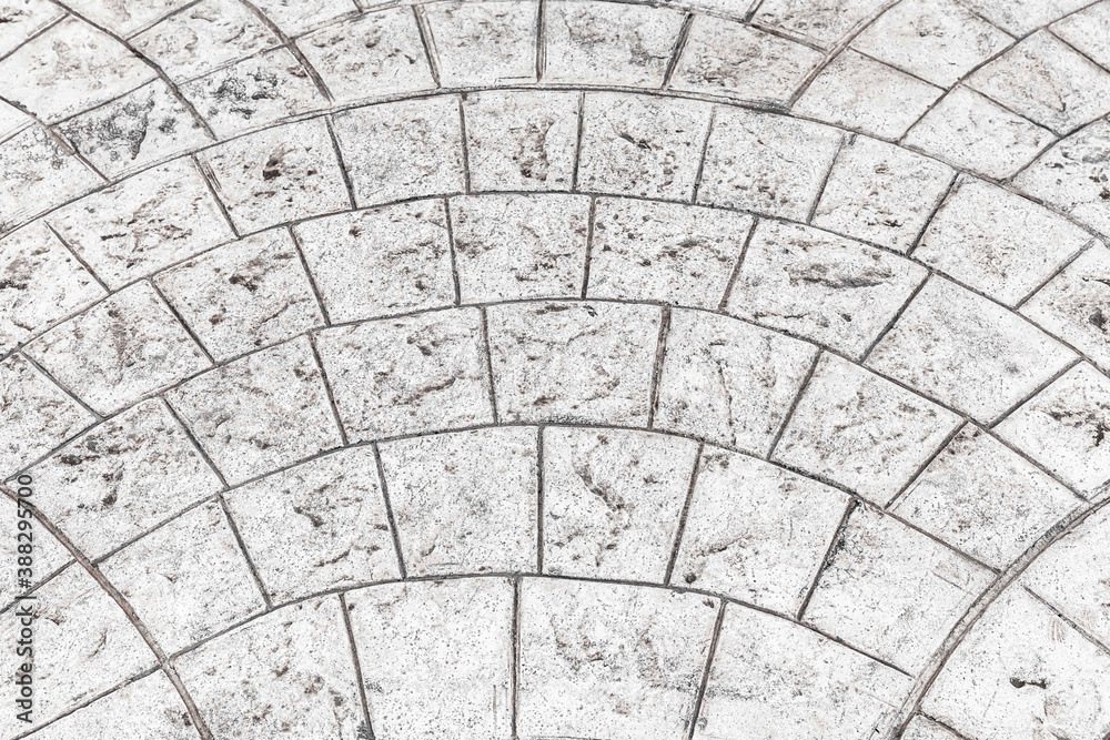 Vintage white cobblestone pavement pattern and background