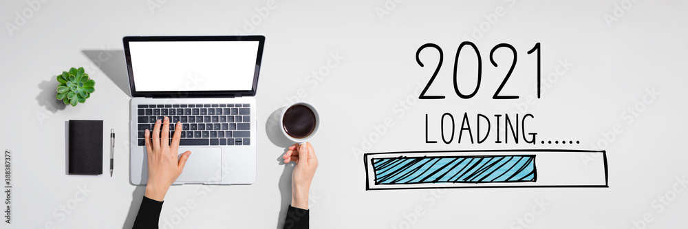 Loading new year 2021 with person using a laptop computer