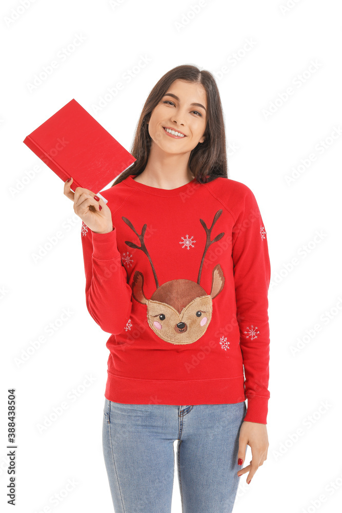 Beautiful young woman with book on white background