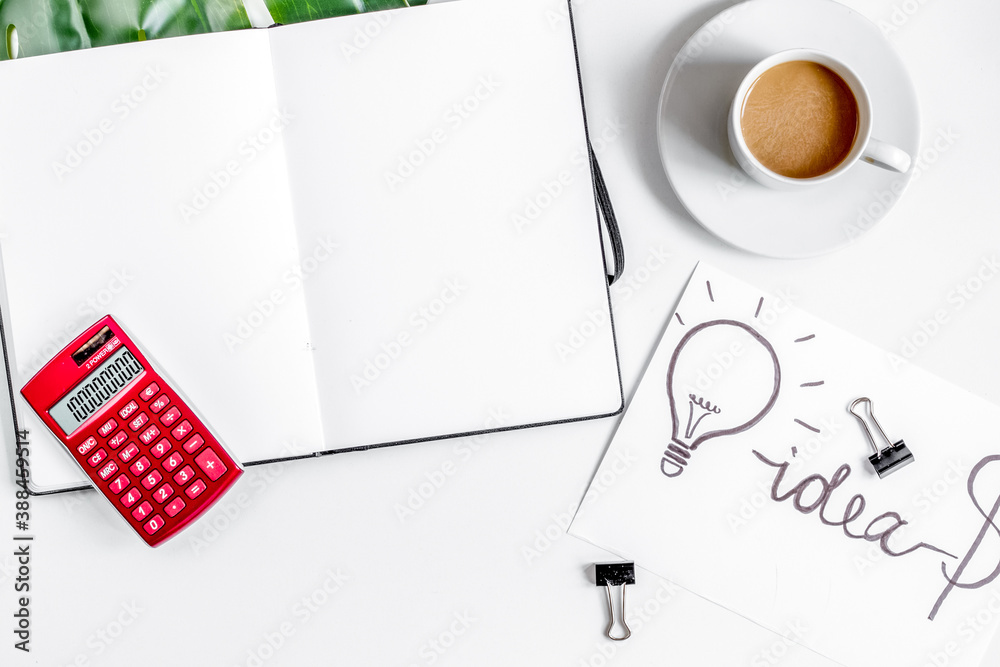 business plan with chart hand-drawn on white table background top view mockup