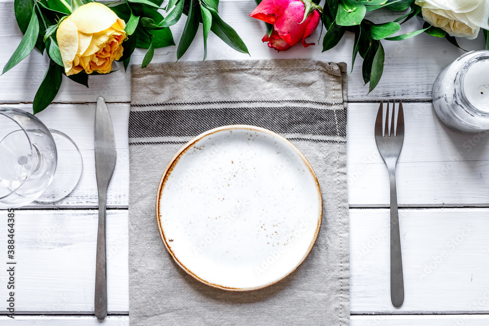 ceramic tableware top view on wooden background mock up