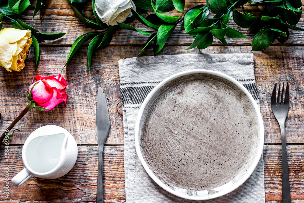 ceramic tableware top view on wooden background mock up