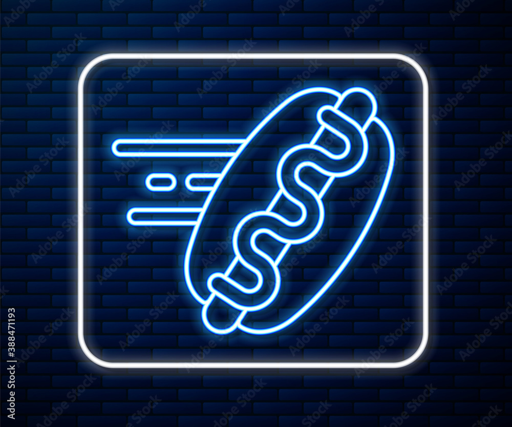 Glowing neon line Online ordering and hotdog sandwich icon isolated on brick wall background. Sausag