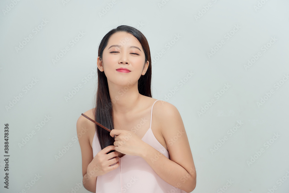 bright picture of beautiful woman with comb