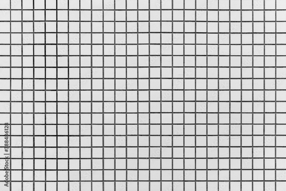 White mosaic wall tile pattern texture and seamless background