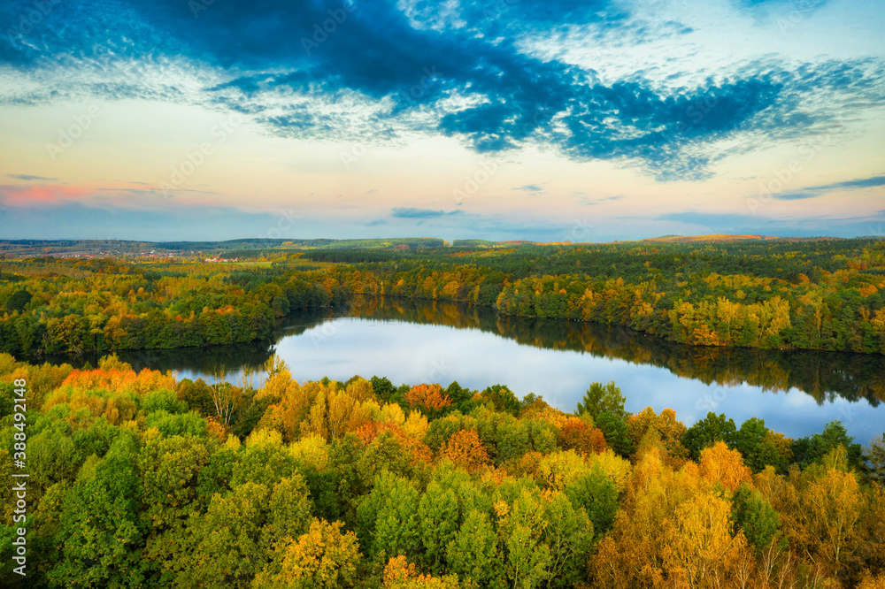 Golden autumn of Poland by the Straszyn lake from above.