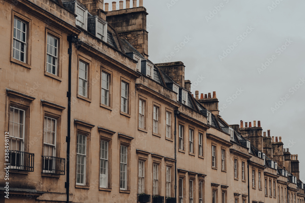 Terraced houses on a street in Bath, Somerset, UK.