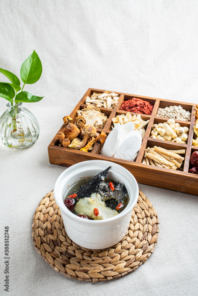 Stewed black-bone chicken with red dates and angelica in Chinese health soup