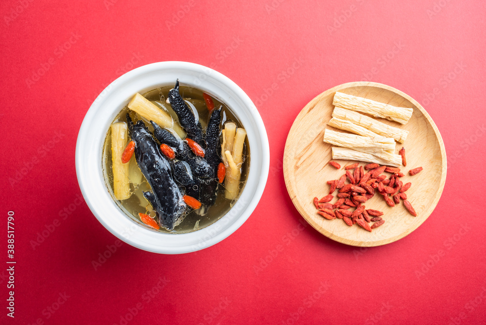 Stewed black chicken soup with codonopsis and wolfberry