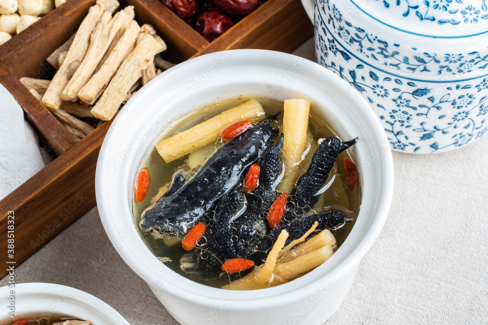 Stewed black chicken soup with codonopsis and wolfberry