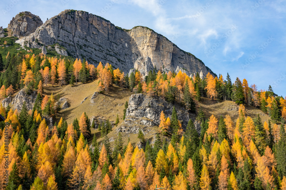 AERIAL: Spectacular view of a beautiful fall colored mountain in Misurina.