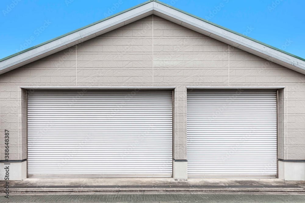 Automatic garage door large white shutter is closed