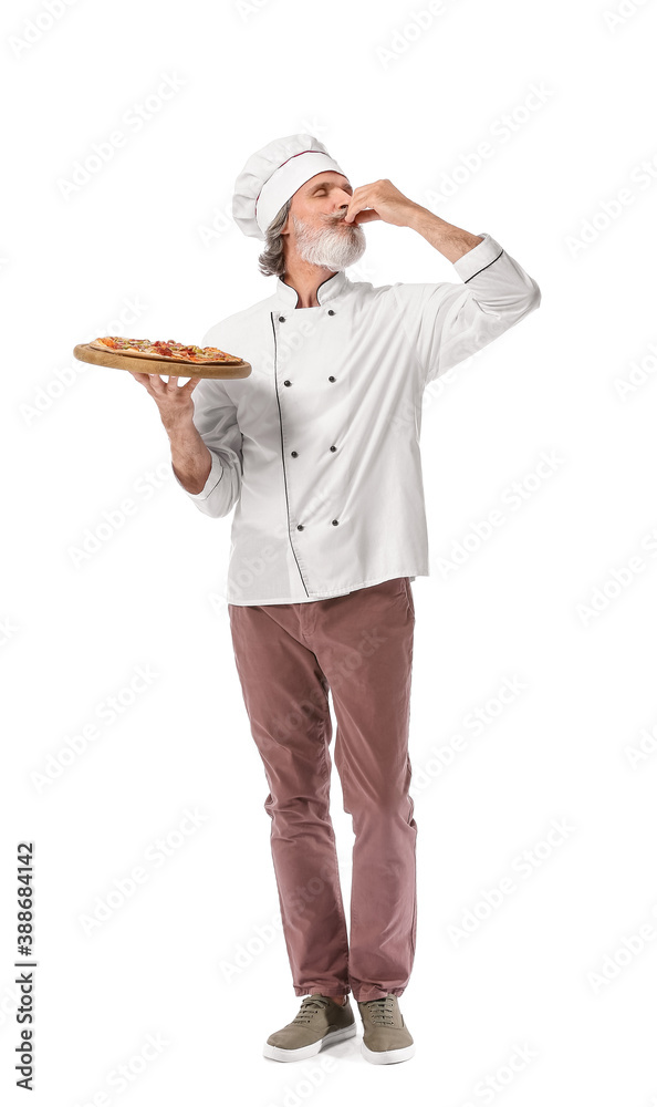 Mature male chef with tasty pizza on white background