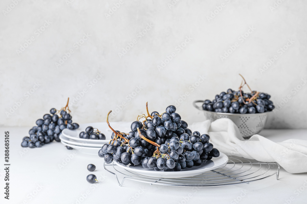 Composition with sweet ripe grapes on table