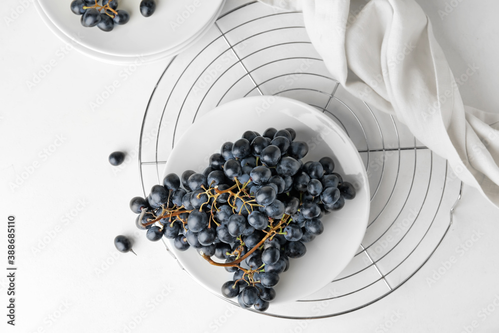 Composition with sweet ripe grapes on table