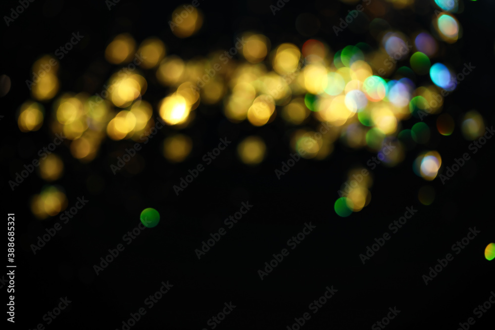 Dark abstract background with blurred lights