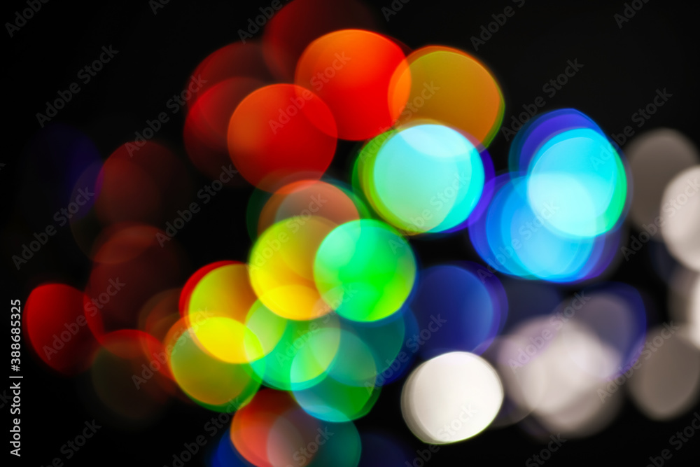 Dark abstract background with blurred lights