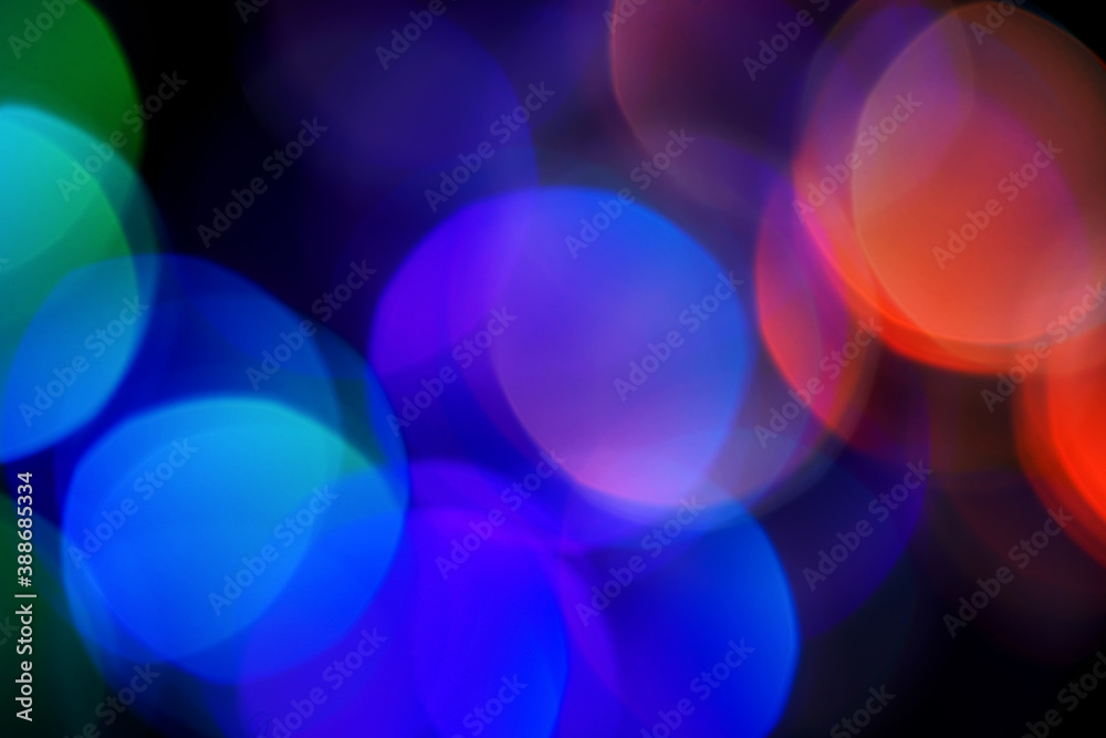 Dark abstract background with blurred lights