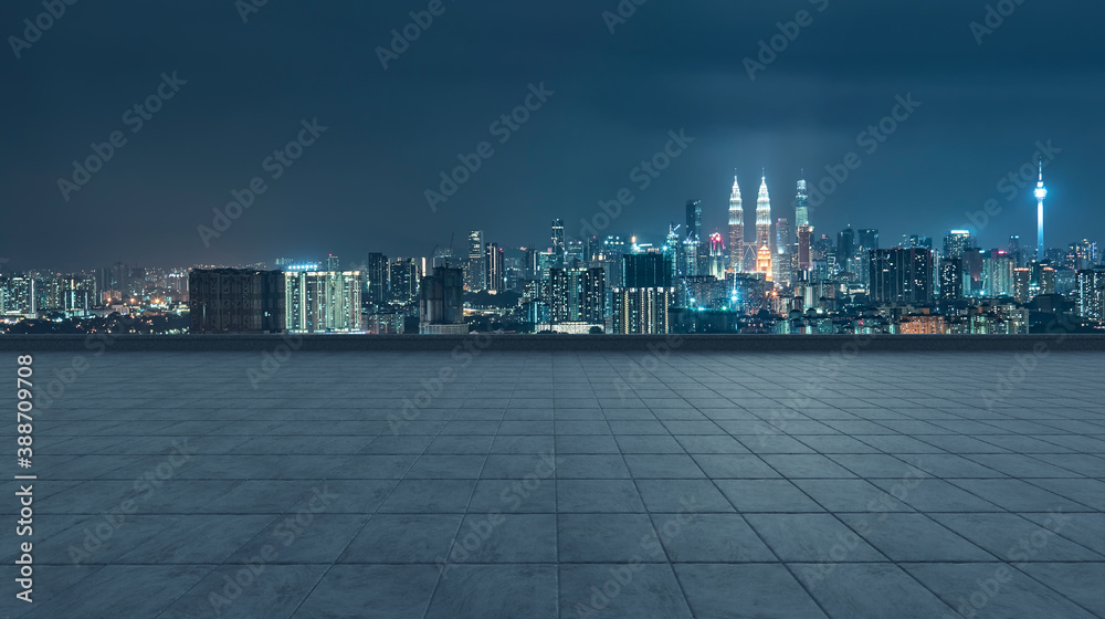 Empty concrete tiles floor with city skyline background