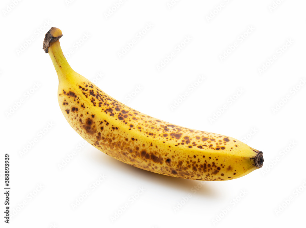 A banana out of a sugar pot placed on a white background