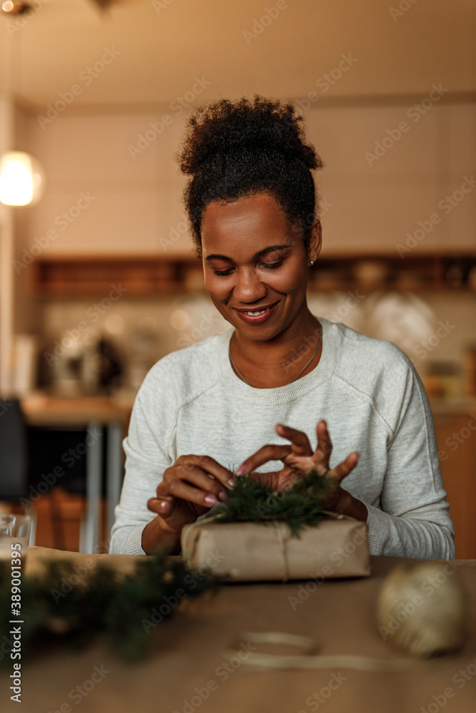 Positive woman, smiling and making gift.