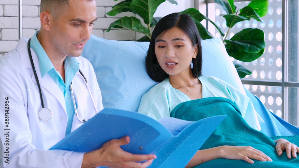 Doctor in professional uniform examining patient at hospital or medical clinic. Health care , medica