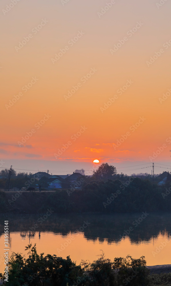 The Kura river flowing through the city of Neftechala at sunrise