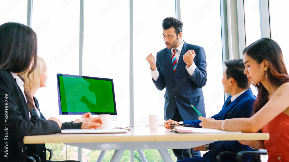 Business people in the conference room with green screen chroma key TV or computer on the office tab