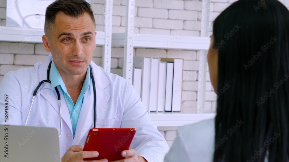 Doctor in professional uniform examining patient at hospital or medical clinic. Health care , medica