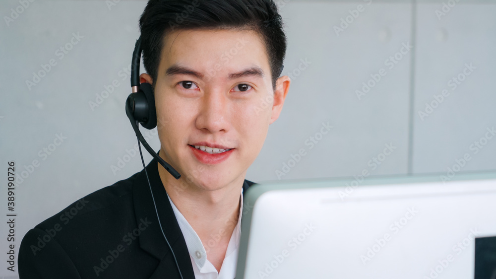 Business people wearing headset working in office to support remote customer or colleague. Call cent