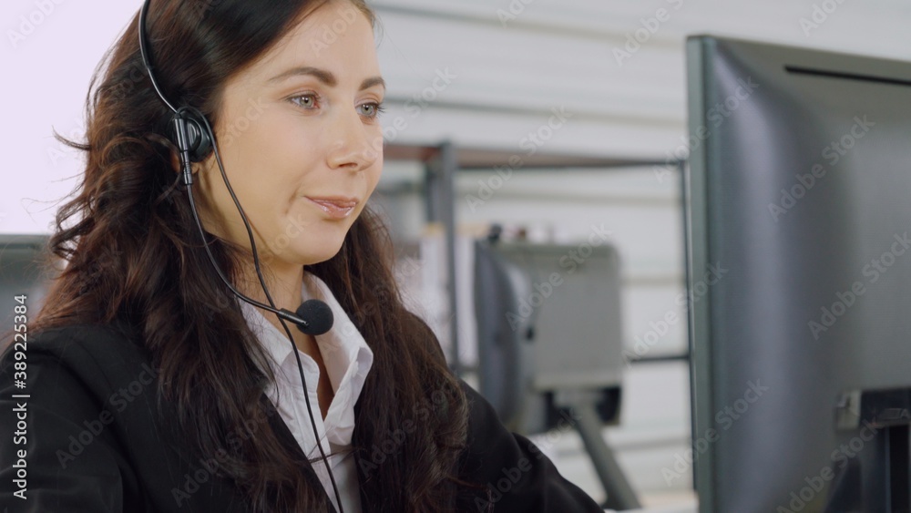 Business people wearing headset working in office to support remote customer or colleague. Call cent