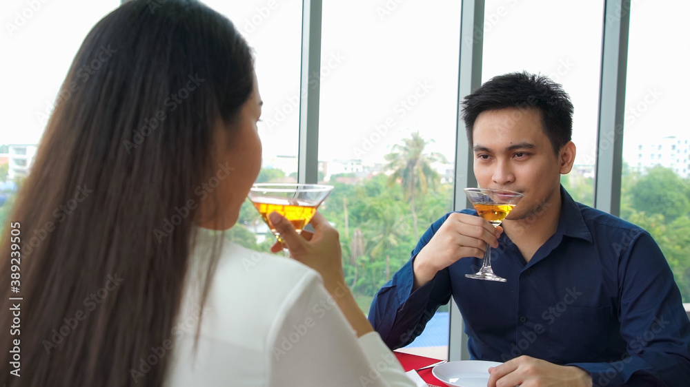 Happy romantic couple eating lunch at restaurant . Couple anniversary celebration and lifestyle .