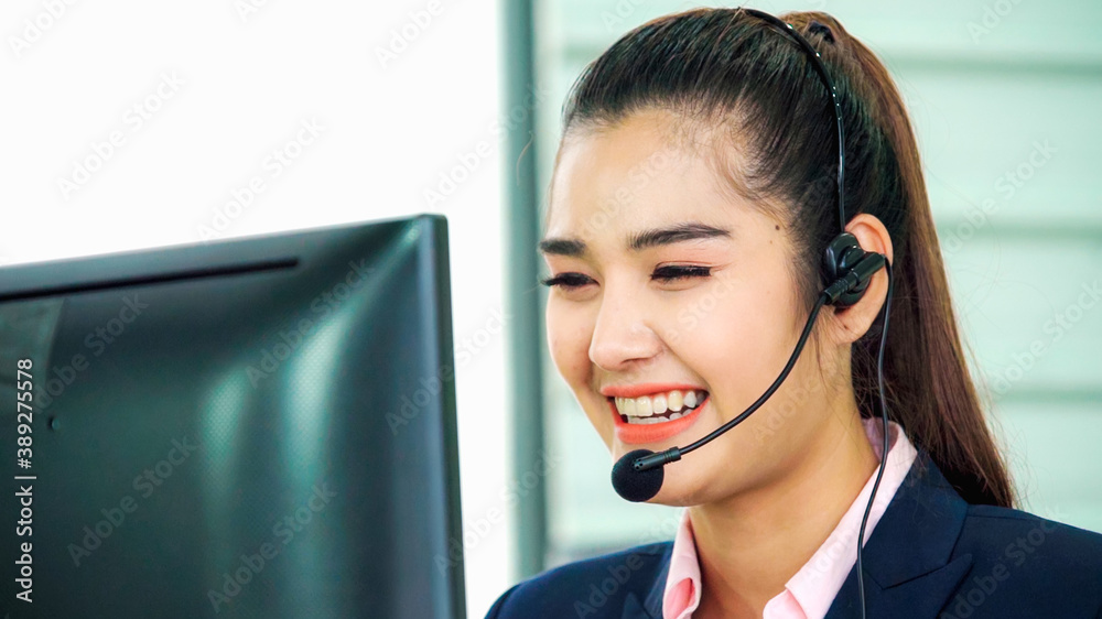 Business people wearing headset working in office to support remote customer or colleague. Call cent